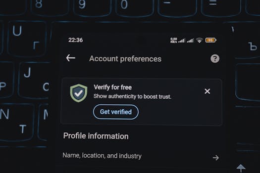 Close-up of a smartphone screen displaying account verification alert. Ideal for security and authenticity themes.